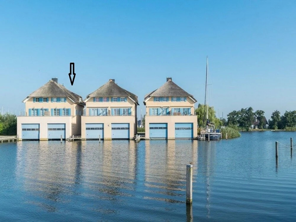 Exclusive Holiday Home Floating on a Lake in Friesland