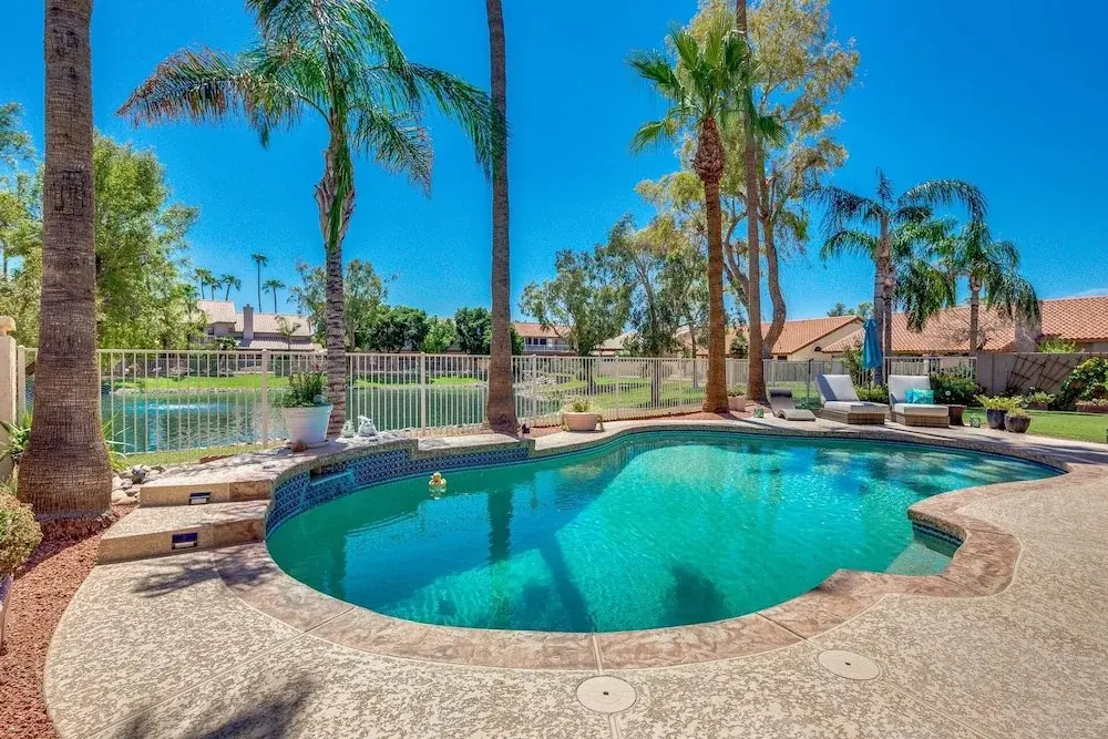 Updated waterfront home w/ private Heated pool & garage. Near Arrowhead shops! by RedAwning, Glendale