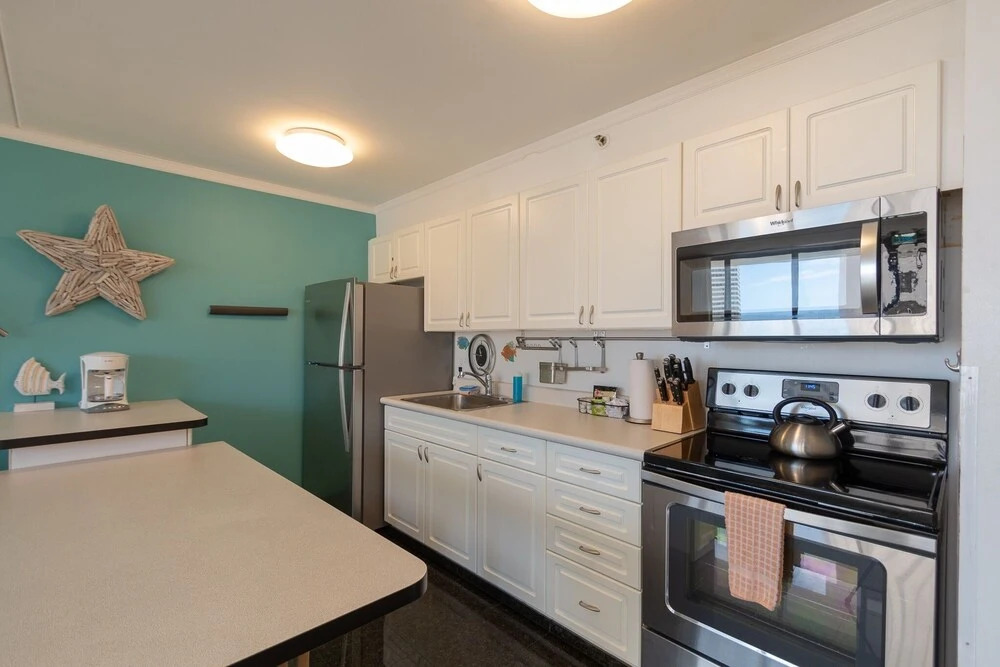 Modern 12th Floor Waikiki Banyan Condo with Partial Ocean Views by Koko Resort Vacation Rentals