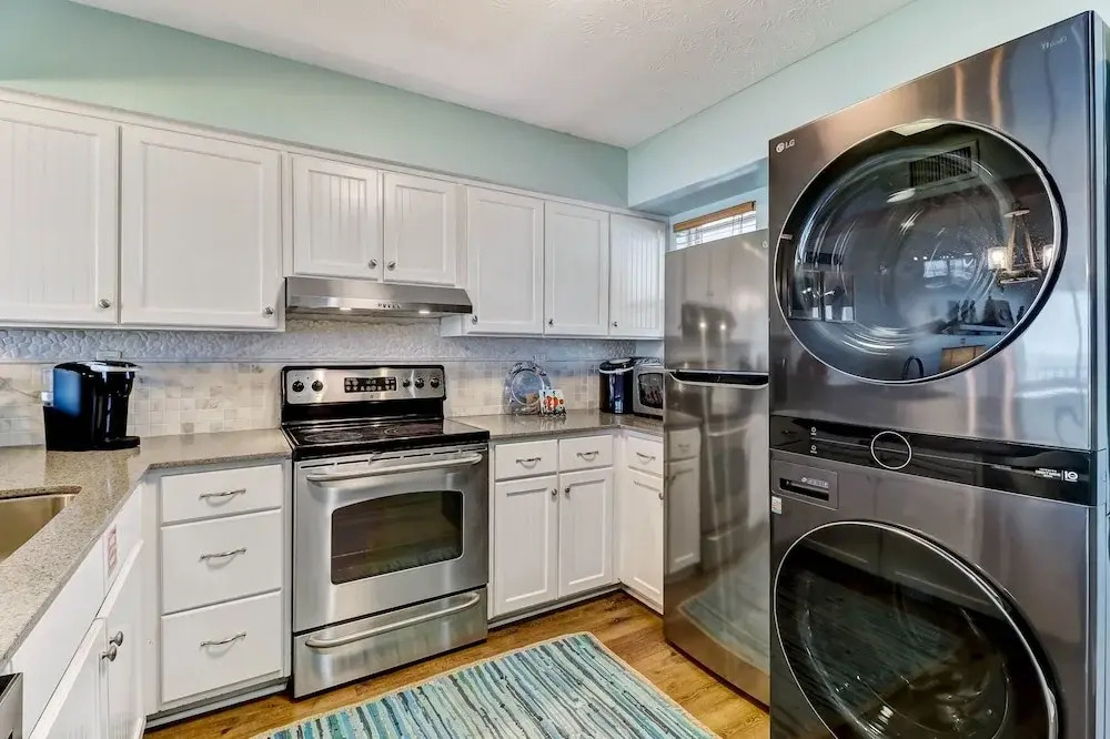 Beach Style Condo Includes Google Mini Home And Beach Access 2 Bedroom Condo by RedAwning