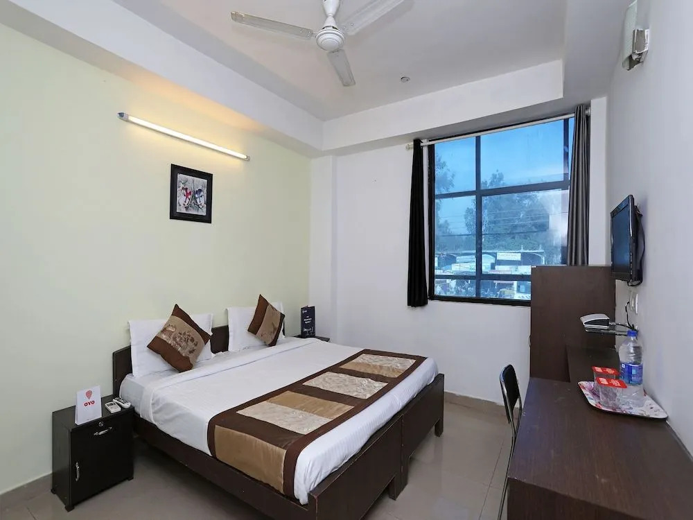 OYO 11392 The Hotel Grand Hospitality