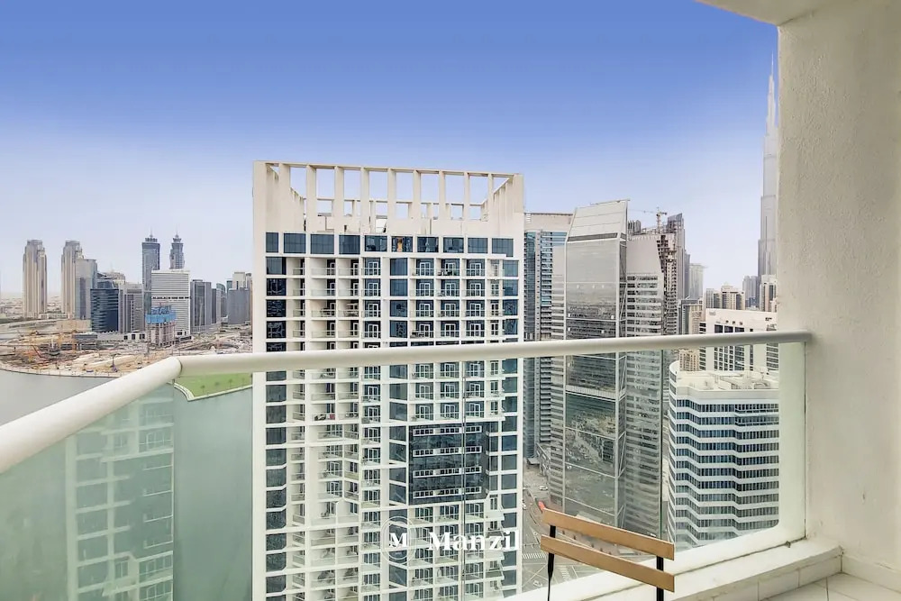 Manzil - 1BR in Business Bay w Burj & Canal Views