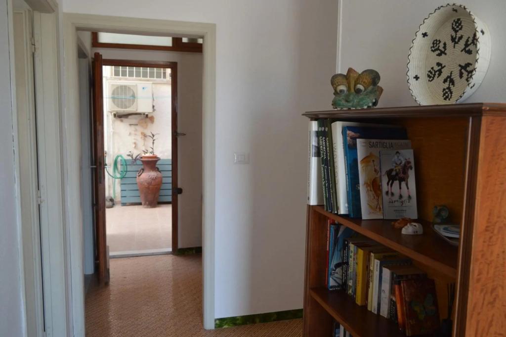 Holiday home on the Torregrande seafront, 30 meters from the seashore-Casa delle Palme