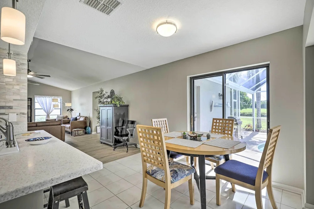 Palm Harbor Home w/ Pool & Golf Course Views!