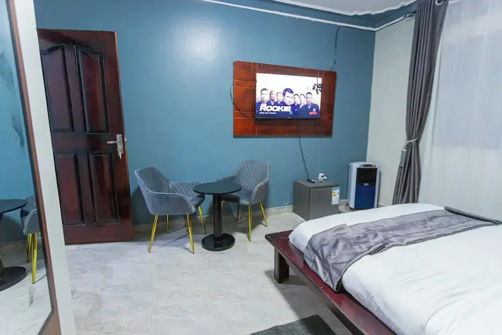 The Den Soroti White