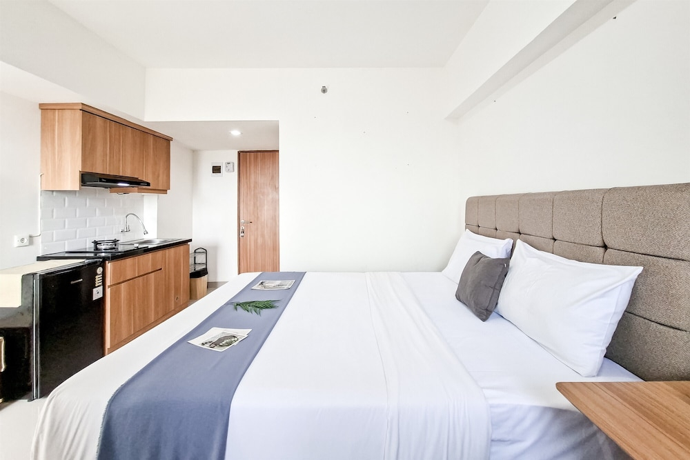 Compact White Studio At Cisauk Point Apartment