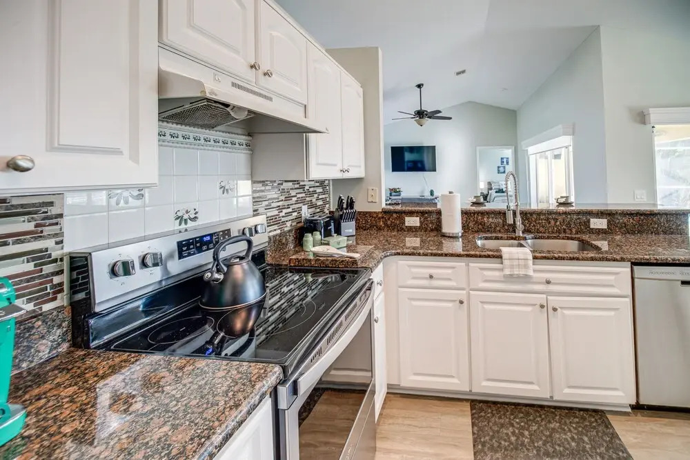 Dock & Fenced Yard: Canal-front Cape Coral Home!