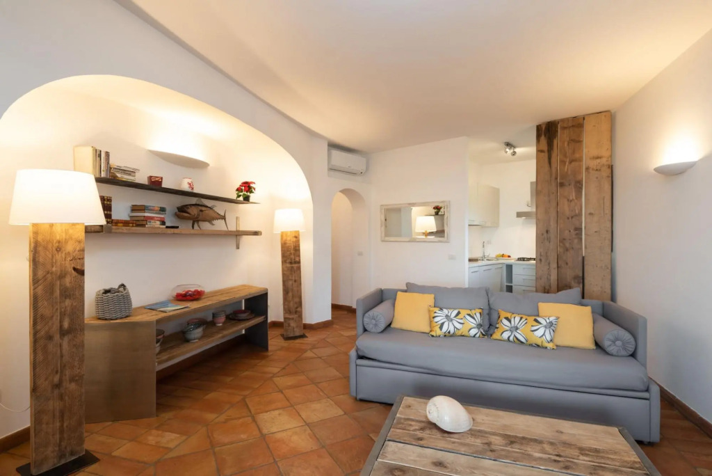 The property includes a double bedroom, a bathroom with a shower, large living room with sofa-bed (f-FIGAROLO1_PP