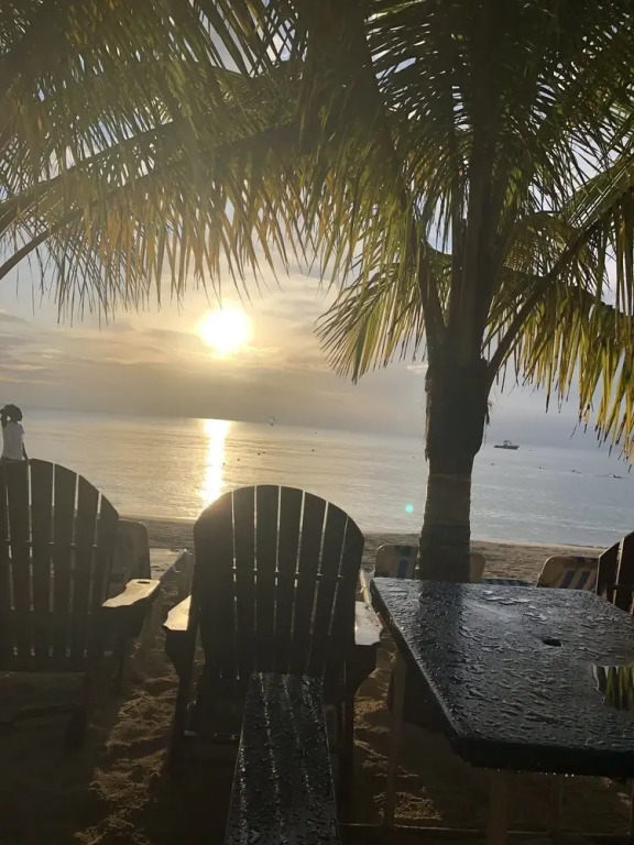 Seacret Studios - Cozy Jamaican Retreat Apts by RedAwning