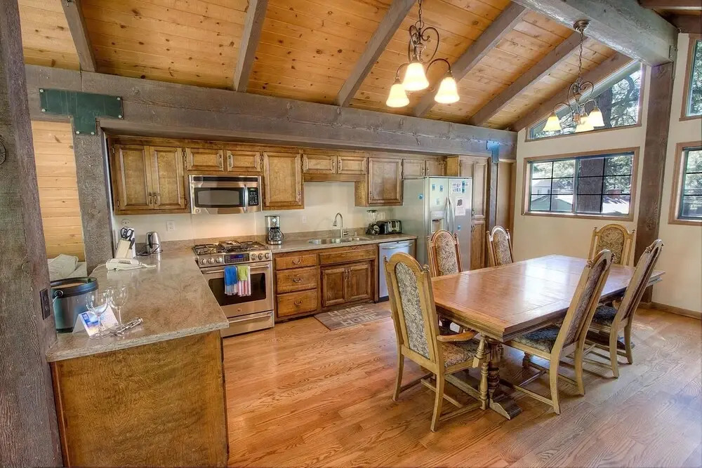 Remodeled Gambrel Style Home with Trees Views by RedAwning