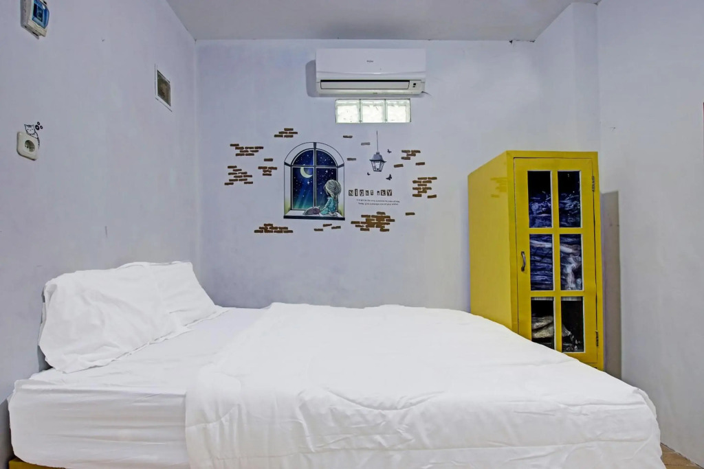 SPOT ON 91506 Guest House Putri Raja