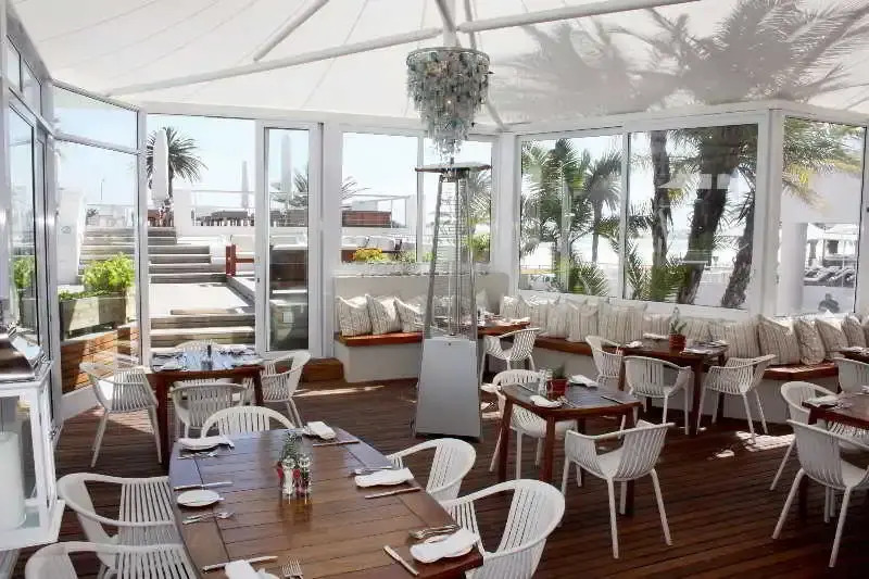 Beach-style Camps Bay Home With Pool and Garden Barbados