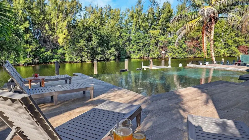 Riverside Veranda by AvantStay | Waterfront Stay + Infinity Pool + Private Dock + Easy Beach Access