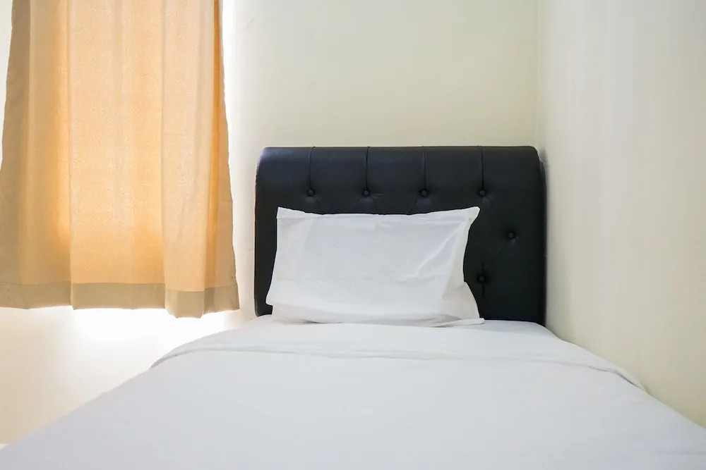 Minimalist 2BR Mediterania Marina Residences By Travelio