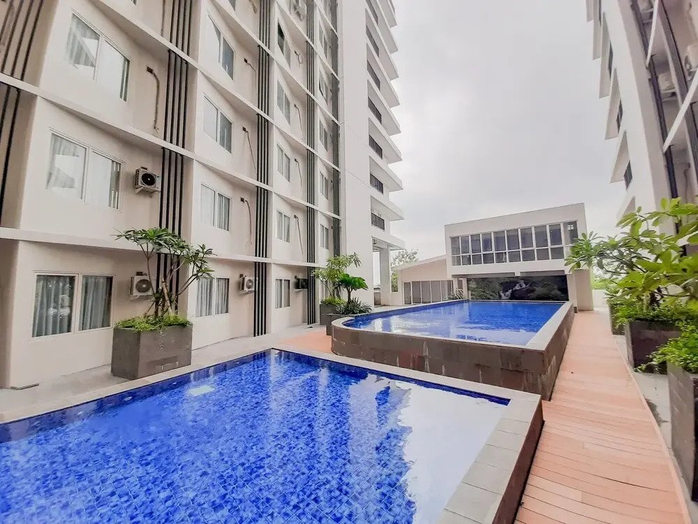 Homey and Minimalist Studio Padina Apartment