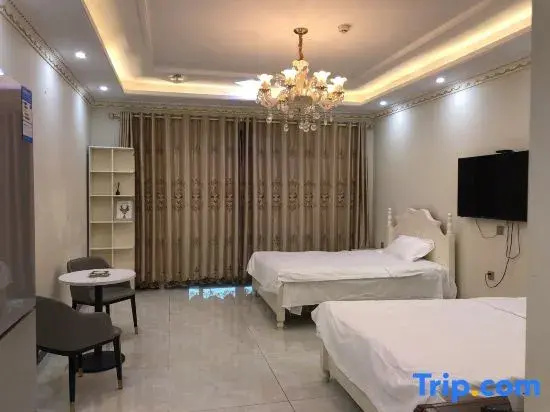 Haikou Bella Smart Apartment (International Convention and Exhibition Center Mengxiang Longteng Bay)