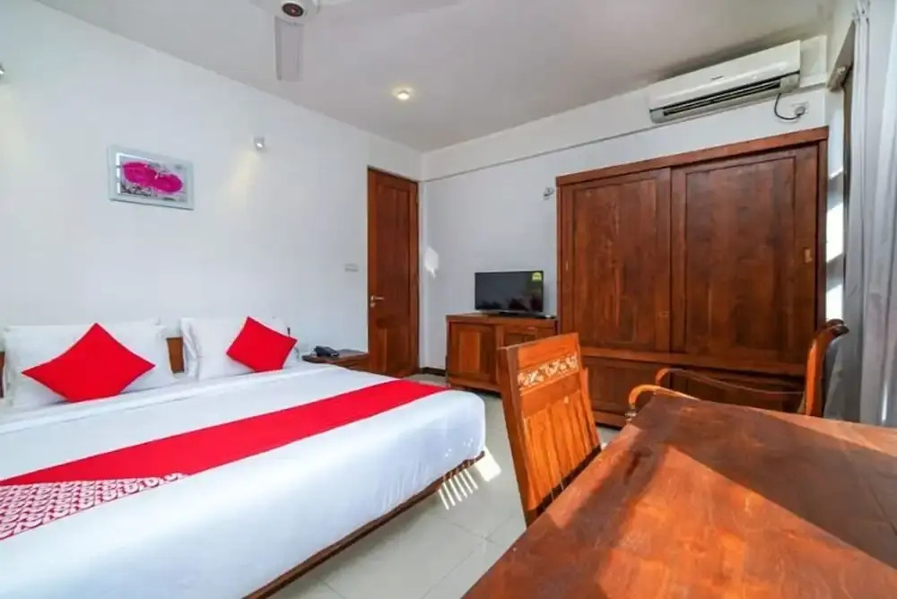 OYO 557 De Mansion