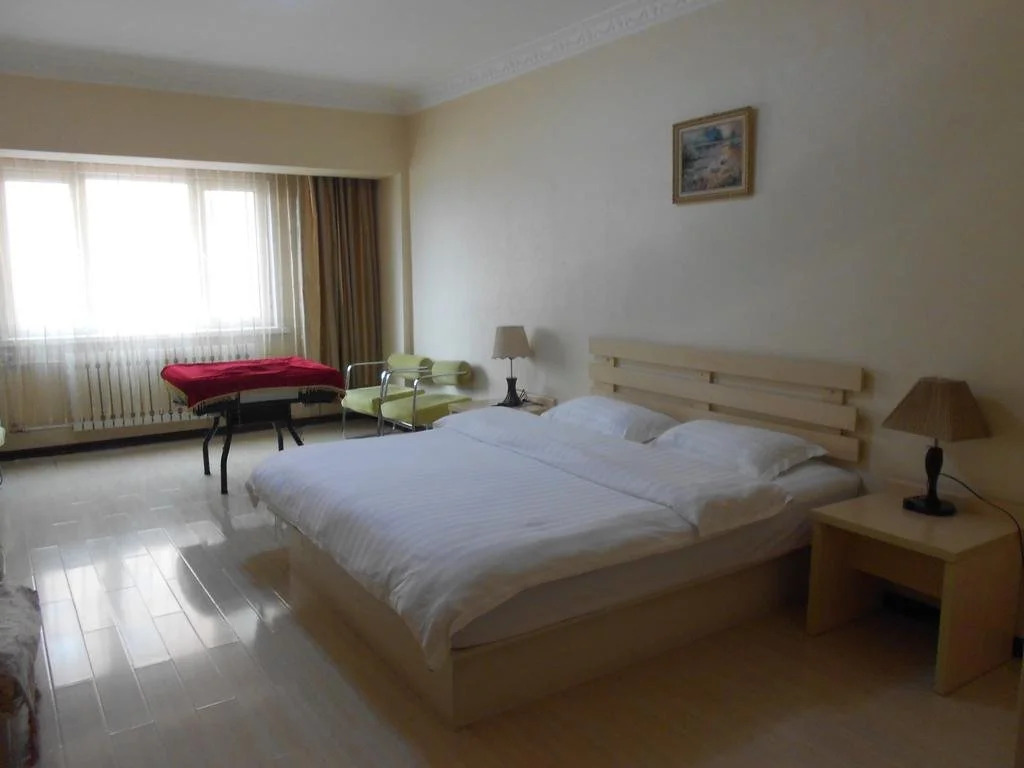Super 9 Business Hotel