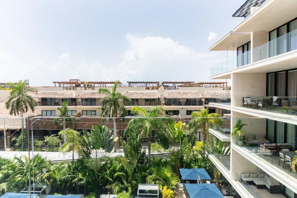 Contemporary Design Oceana 422 Playa del Carmen Condo by RedAwning