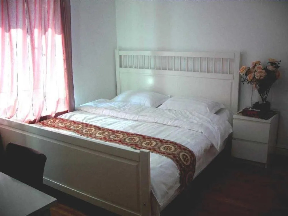 Fangfei Holiday Apartment Hotel