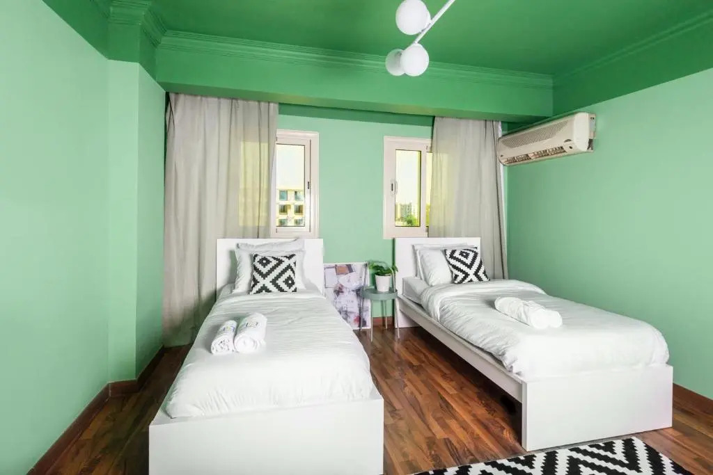 Distinct & Decent 2 BDR Apt Steps From Nightlife and Airport