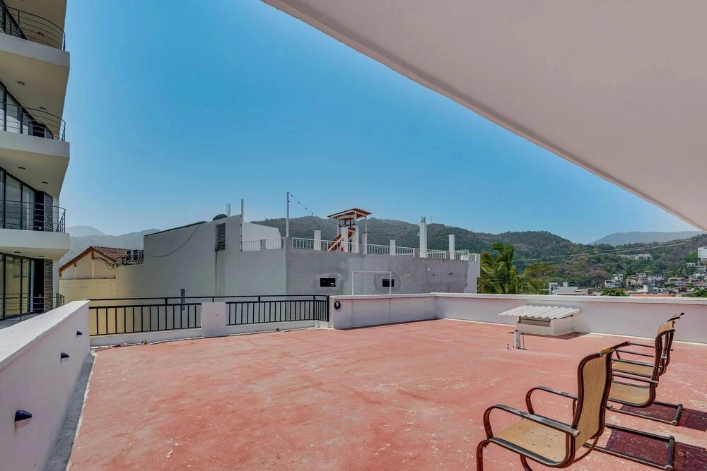 Walk to Beach + Rooftop Views: Puerto Vallarta Apt