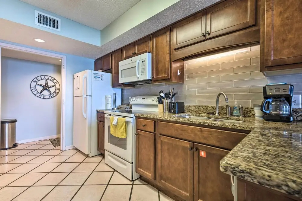 Beachfront Condo With Balconies & Pool Access!