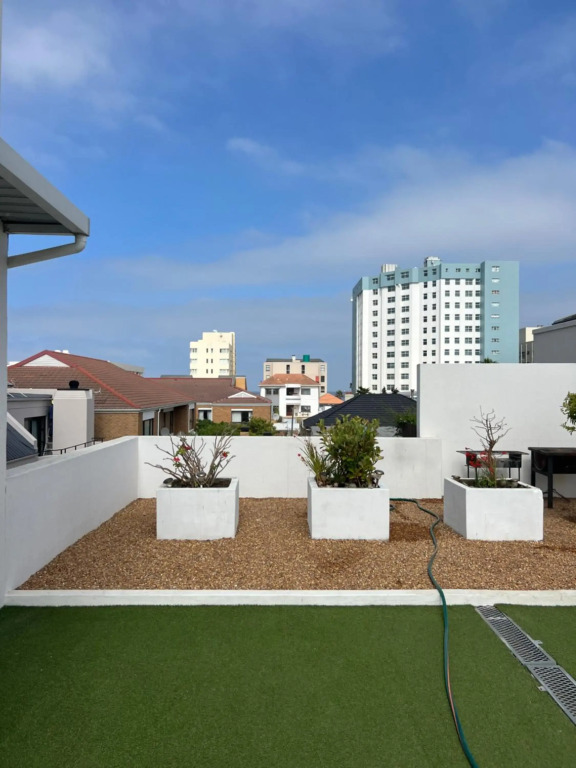 Cozy two bedroom unit in Strand with pool gym and laundromat