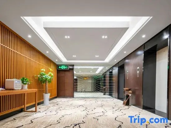 Xindi Hotel (Zhengzhou Zhongyuan Wanda Store Qinling Road Subway Station)
