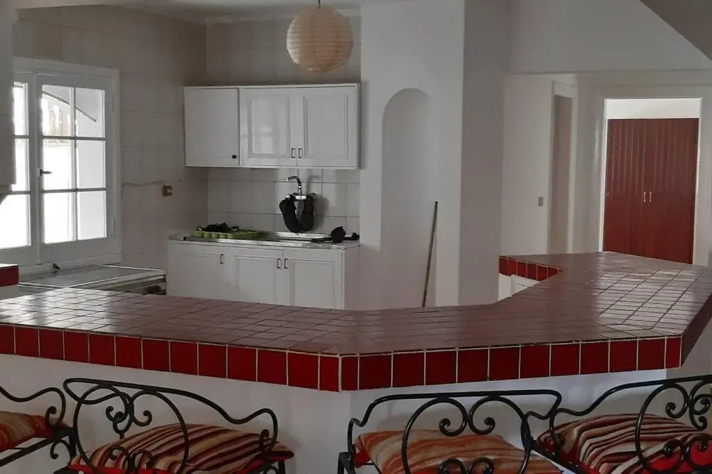 Beach apartment in front of the sea