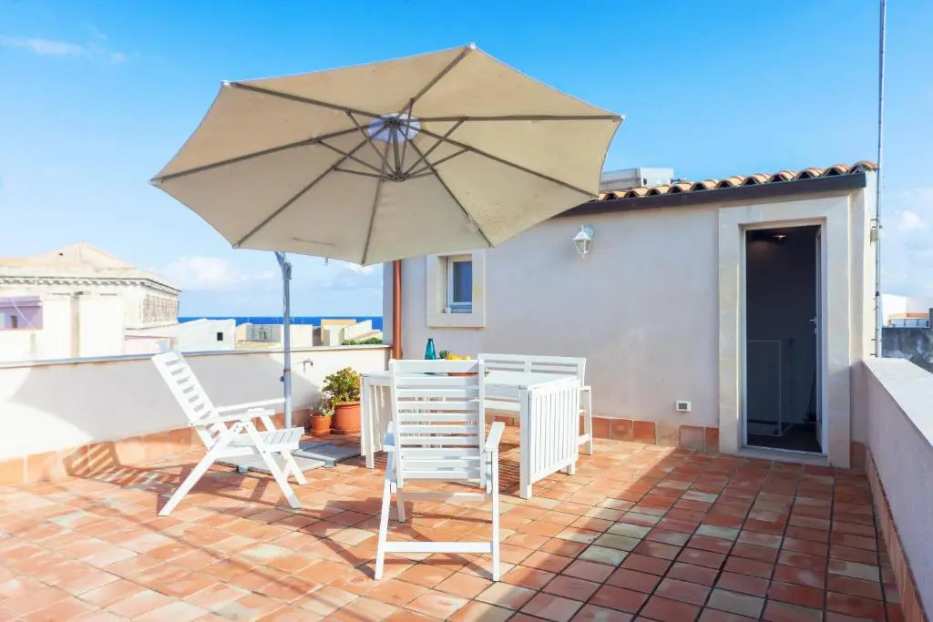 GuestHost - Mercato di Ortigia Apartments