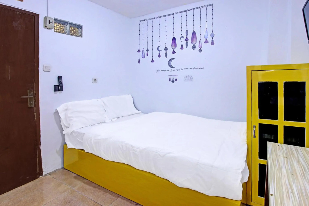 SPOT ON 91506 Guest House Putri Raja