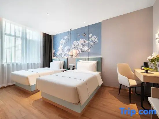 Magnotel Hotel (Taian Xintai Qingyun Shopping Center Jindou Road)
