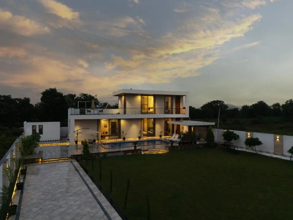 SaffronStays Raaga - luxury 4BR villa with private pool, lawns, gazebos & sweeping Aravalli hill vie