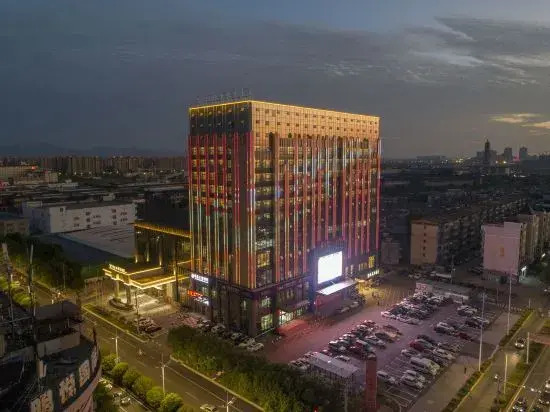 Vienna International Hotel (Zhangshu Times Square Renhe)