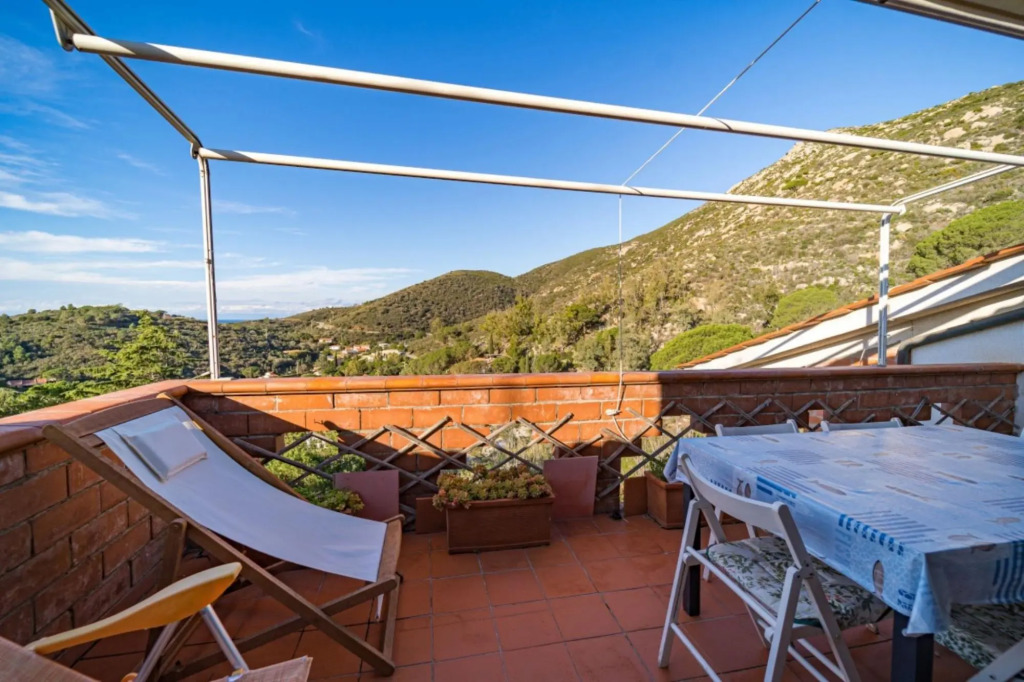 Cala Azzurra in Fetovaia with terrace overlooking the Amazing Gulf-CALA AZZURRA