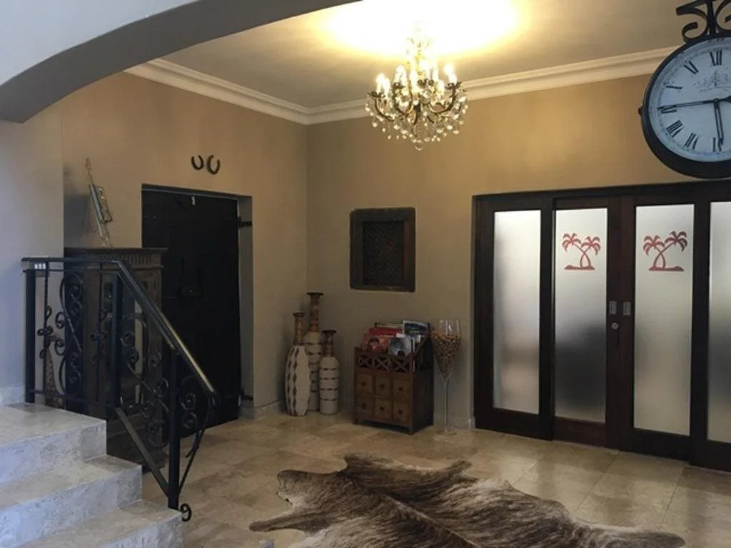 African Palm Cottage and Guesthouse