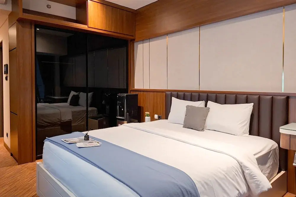 Modern Rustic Studio Apartment At Carstensz Residence