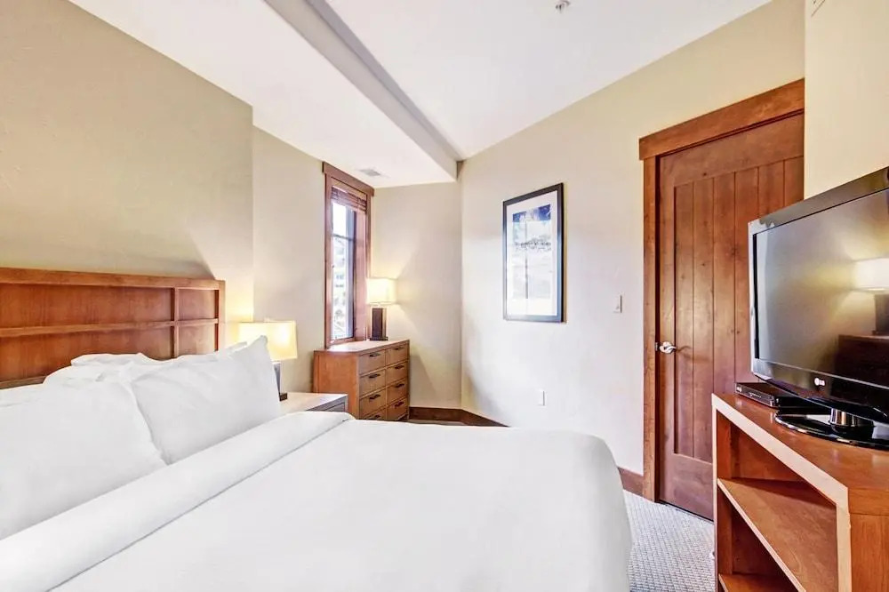 Luxury  At Base Of Peak 8, Steps From Winter Activities 2 Bedroom Condo by RedAwning