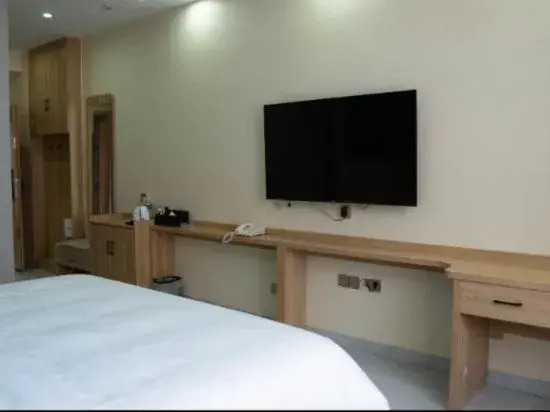 Grace Inn Qingju Hotel (Yanggu Wanhe City Branch)