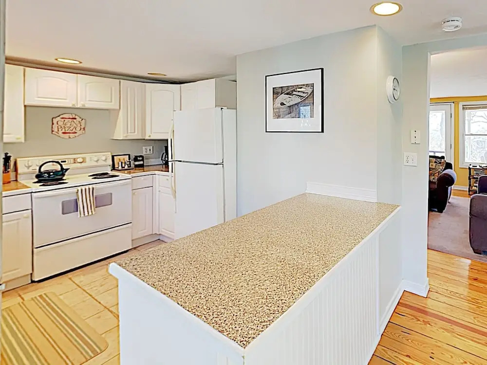 Coastal Charmer W/ Lovely Bay Views & Porch 3 Bedroom Home