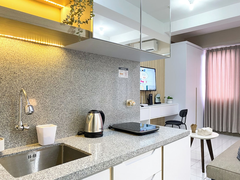 Minimalist And Homey Studio At Grand Kamala Lagoon Apartment