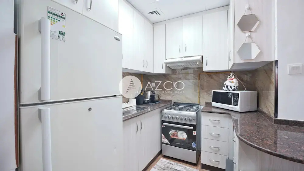 Cozy 1 BHK with City View in JVC by AZCO