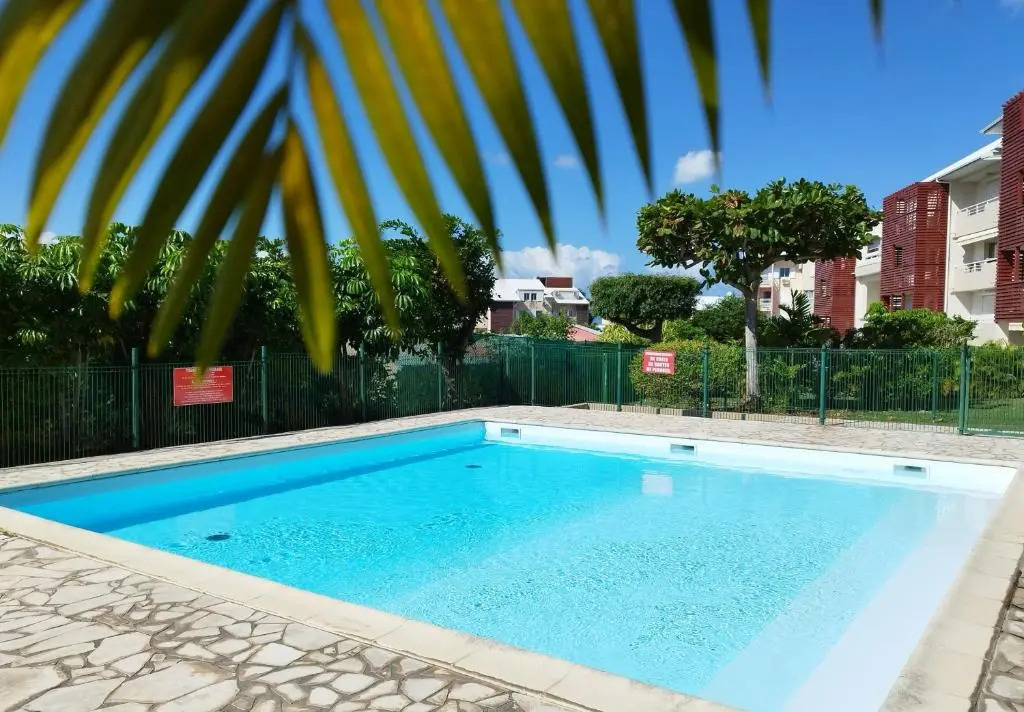 Appartement d'une chambre a Le Gosier a 300 m de la plage avec piscine partagee jardin clos et wifi