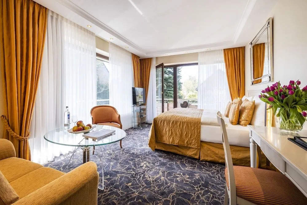 Büngers Apartment-Hotel mit Gartensauna - modern, gemütlich und strandnah