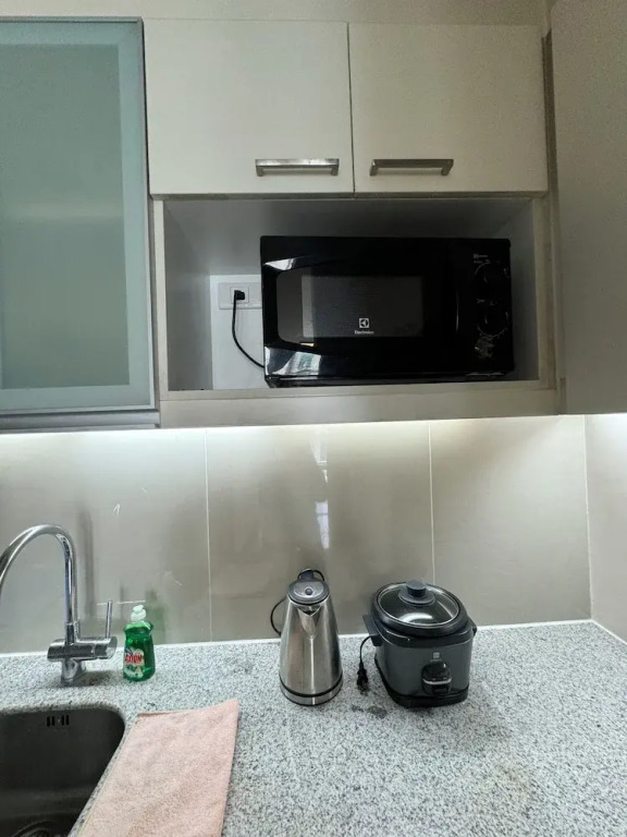 Mactan Newtown Condo with Pool access