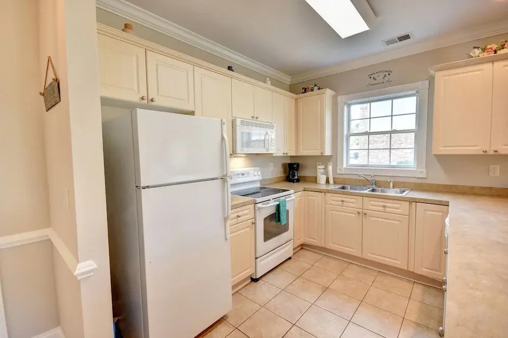 4851 Luster Leaf Cir Unit 101, Magnolia Pointe 3 Bedroom Condo by RedAwning