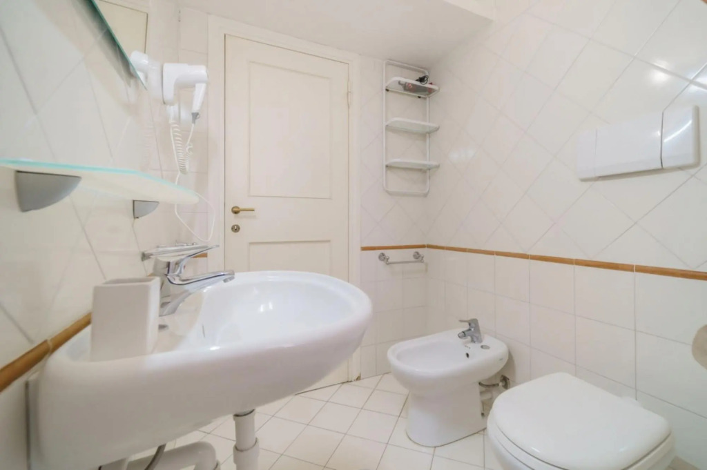 Baia Blu 1 in a small complex of colourful houses that directly overlooks the beach of Forno.-BAIA BLU N°1