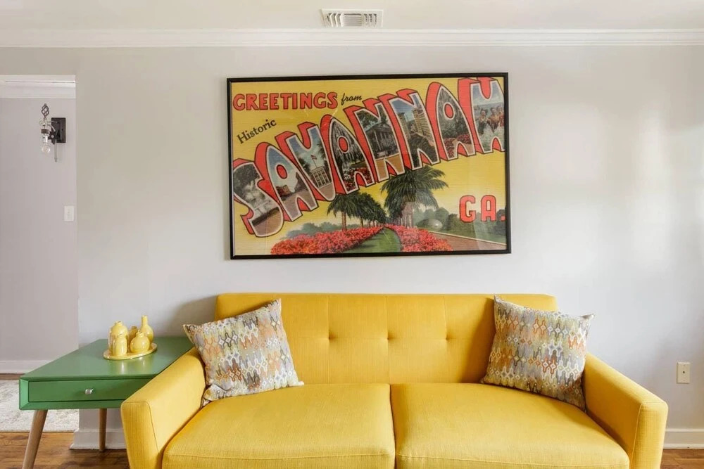 Vibrant, Colorful Condo Building With Backyard Firepit and Games