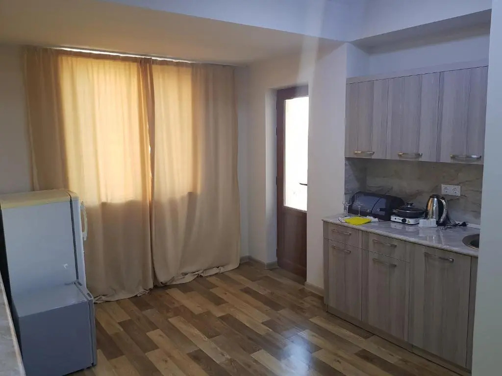 Отель Cross Apartments and Tours